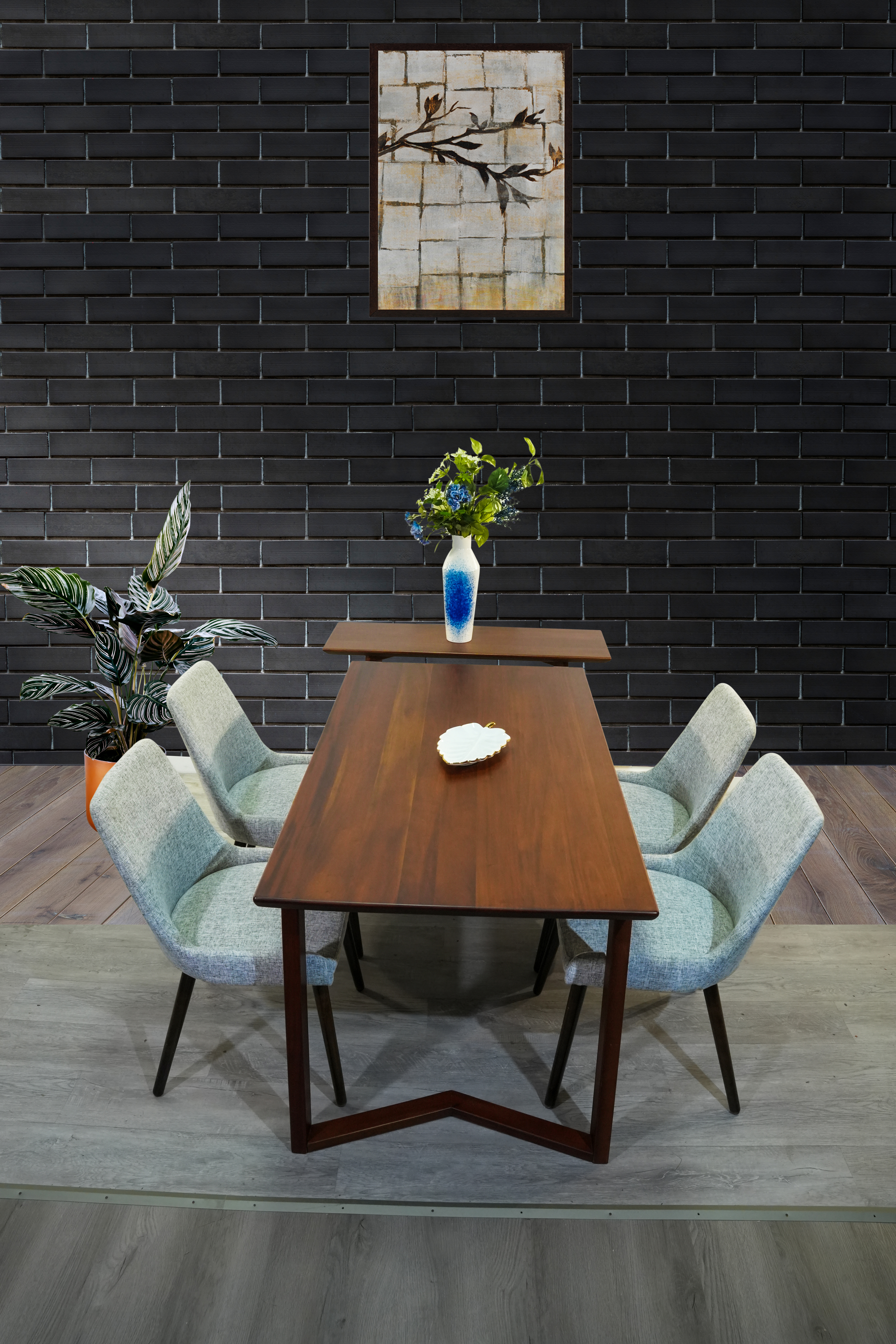 Milo dining table with sculptural solid wood base
